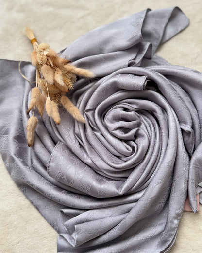 CHALE EN JACQUARD A MOTIF INTEGRE ARGENTE